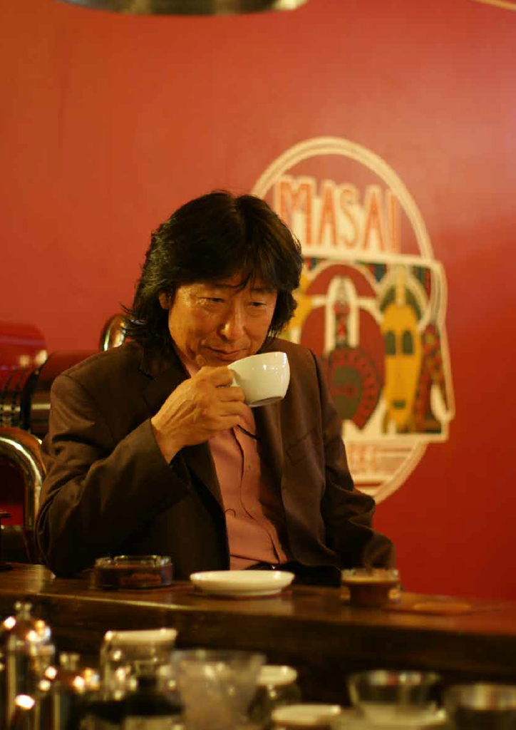 University of Arizona student looking into a telescope